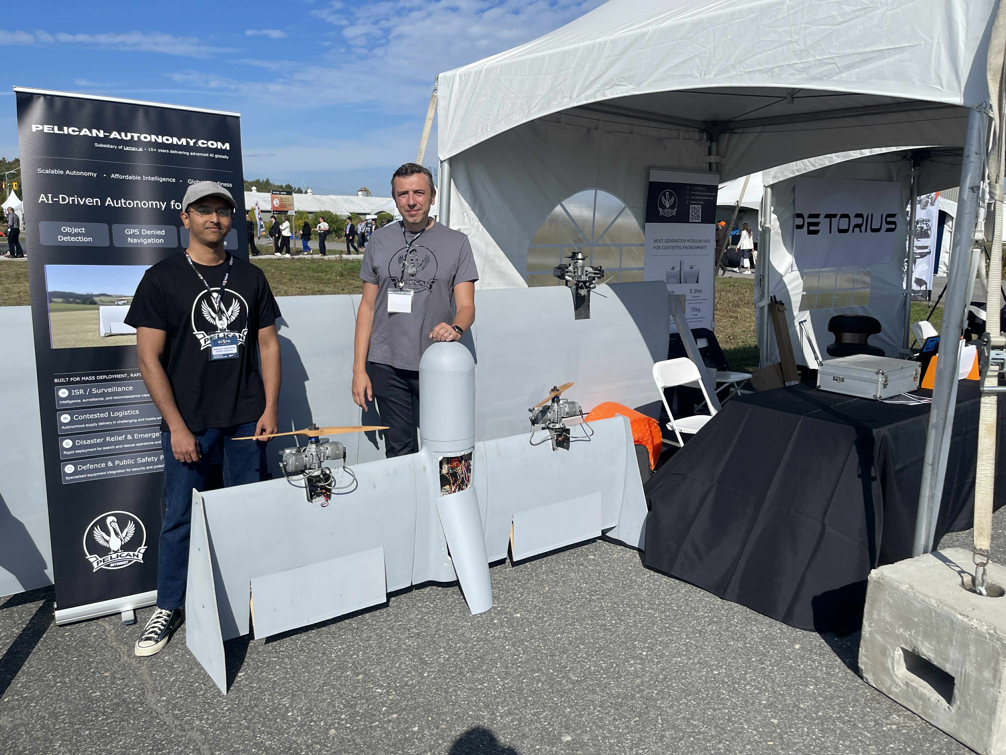 Pelican Autonomy exhibition booth with flight hardware
